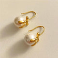 Pearl Bow 925 Silver Earrings